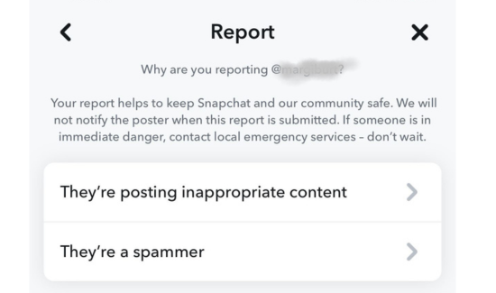 how to report people on snapchat