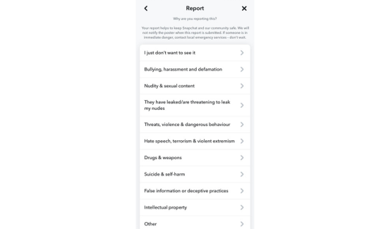 how to report people on snapchat